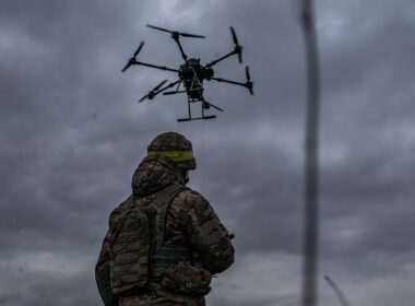A Ukrainian soldier with a drone.