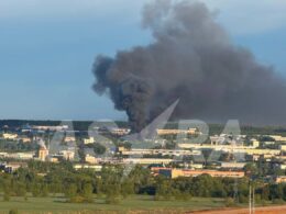 Smoke rose after drones attacked fiber optic production facilities in Russia's Saransk on 7 May.