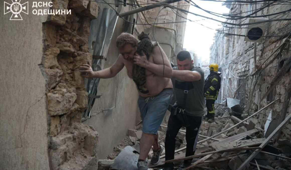 russia targeted ukraine 440 drones 32 missiles deadly overnight attack ukrainian air force says emergency workers rescue man cat after russian odesa 17 2025 service oblast 8499c408-b08a-4b56-a563-094c63a67f16 defenses neutralized 402