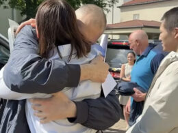 Belarus political prisoner Sergei Tikhanovsky hugs his wife and key Belarusian opposition figure Svetlana Tikhanovskaya after he was released on 21 June 2025 following five years in prison on 