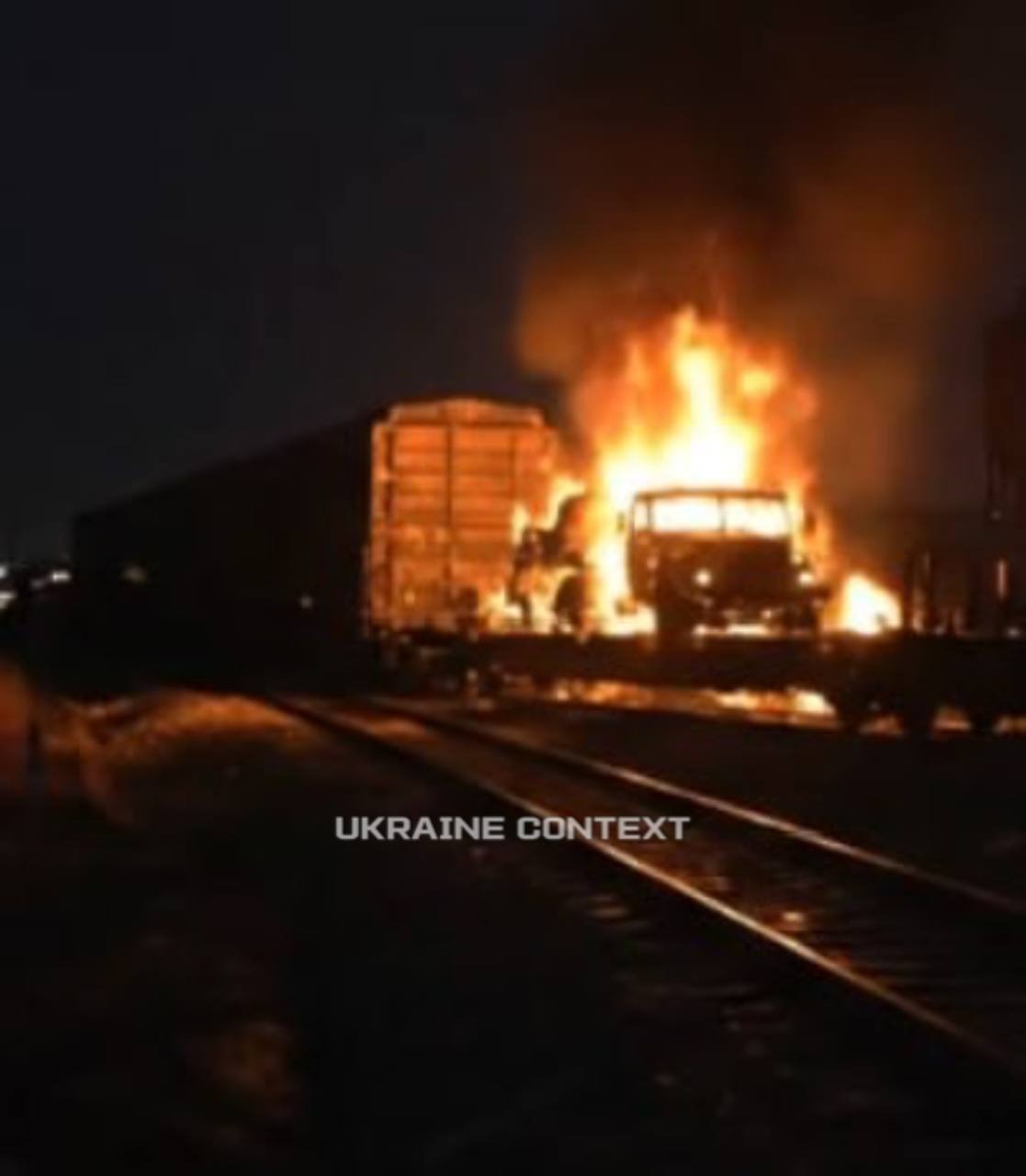 A truck burns on a rail flatcar at Salsk station in Rostov Oblast after a drone strike overnight on 29 July 2025. Source: Telegram channel Ukraine context | russia no context