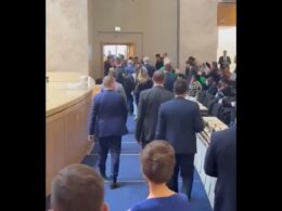 Dozens of parliamentarians abandon hall as Russian sanctioned official takes podium and spreads propaganda at an international conference in neutral Switzerland.