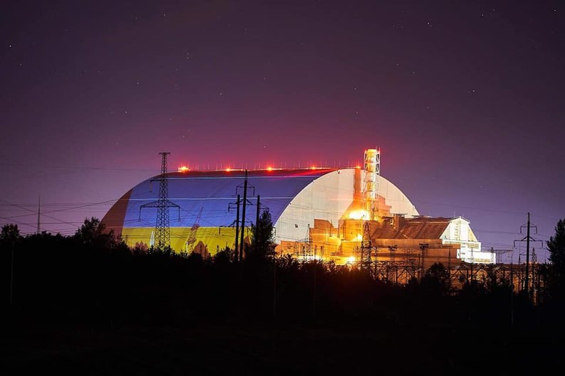 Ukrainian flag on the radiation containment structure,