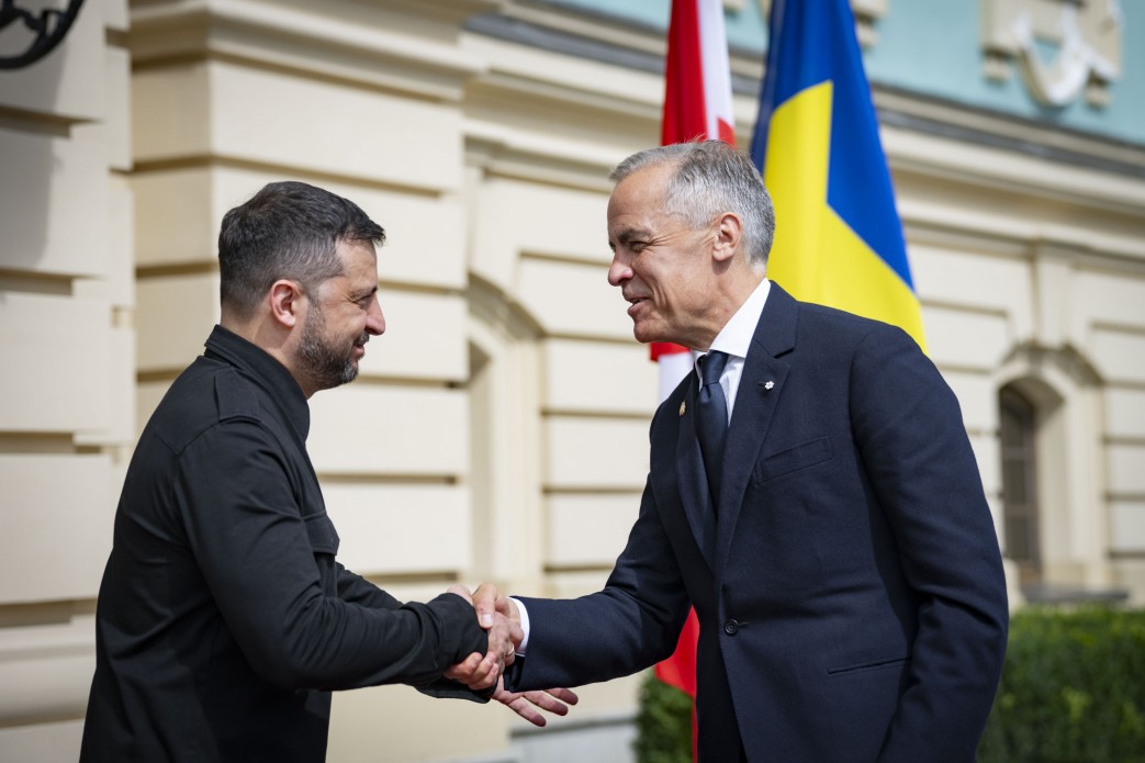 Ukrainian President Volodymyr Zelenskyy greets Canadian Prime Minister Mark Carney in Kyiv on 24 August 2025 during Ukraine's Independence Day ceremonies.