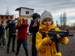 Uzhgorod region, Ukraine - February 19, 2022: Civilians in Ukraine are training in one of the abandoned factories to defend their country in case of Russian invasion.