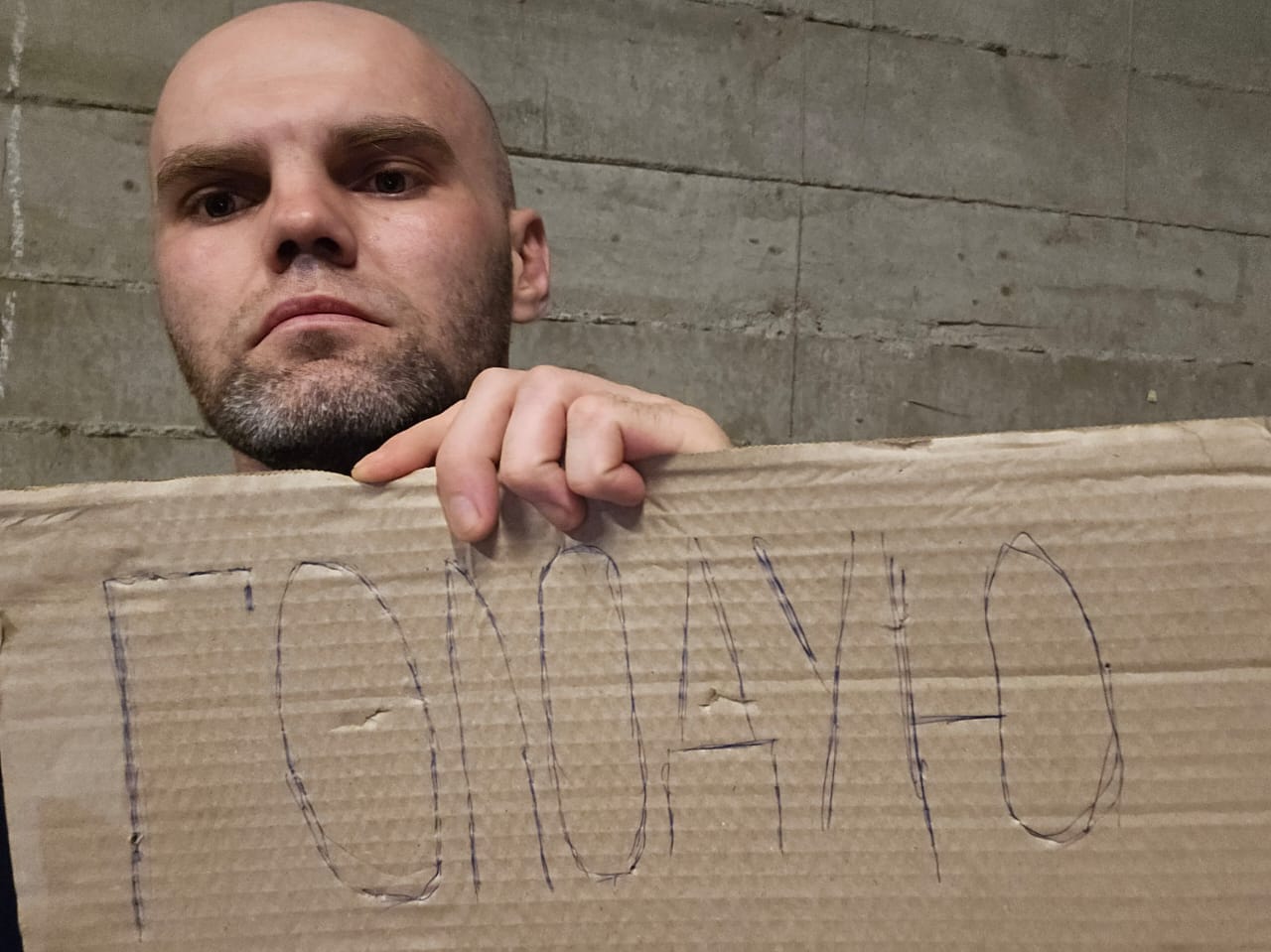 Ukrainian deportee held in captivity at Georgian border.