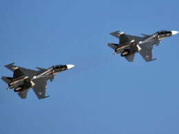 Russian Su-30 fighter jets in flight.
