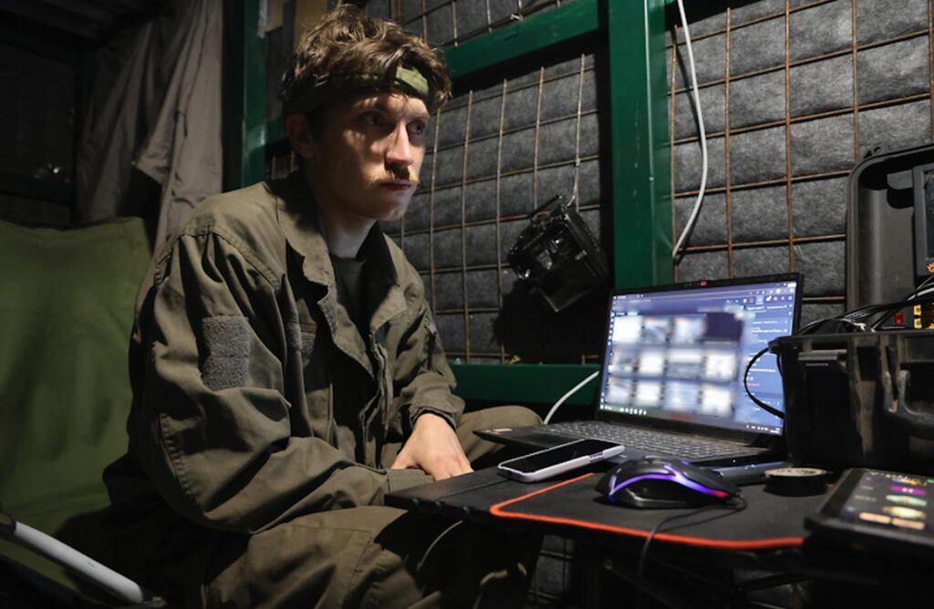 Bohdan, a drone pilot from Unmanned Systems Battalion of Ukraine’s 110th Separate Mechanized Brigade, prepares for an FPV bombing mission.