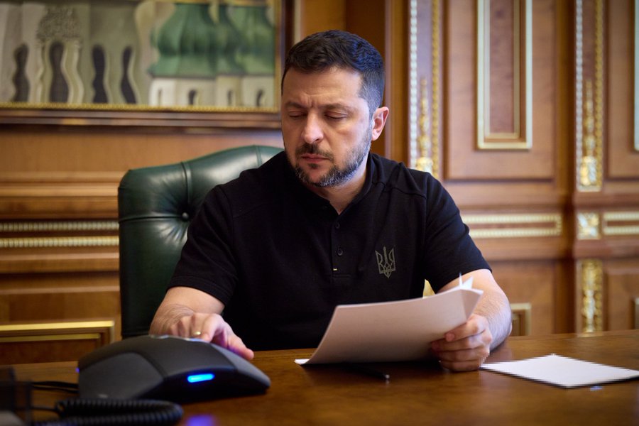 President Volodymyr Zelenskyy on a call in a government office.