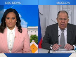 Split screen showing NBC News "Meet the Press" interview with interviewer Kristen Welker in NBC studio on left and Russian Foreign Minister Sergey Lavrov speaking from Moscow on right.