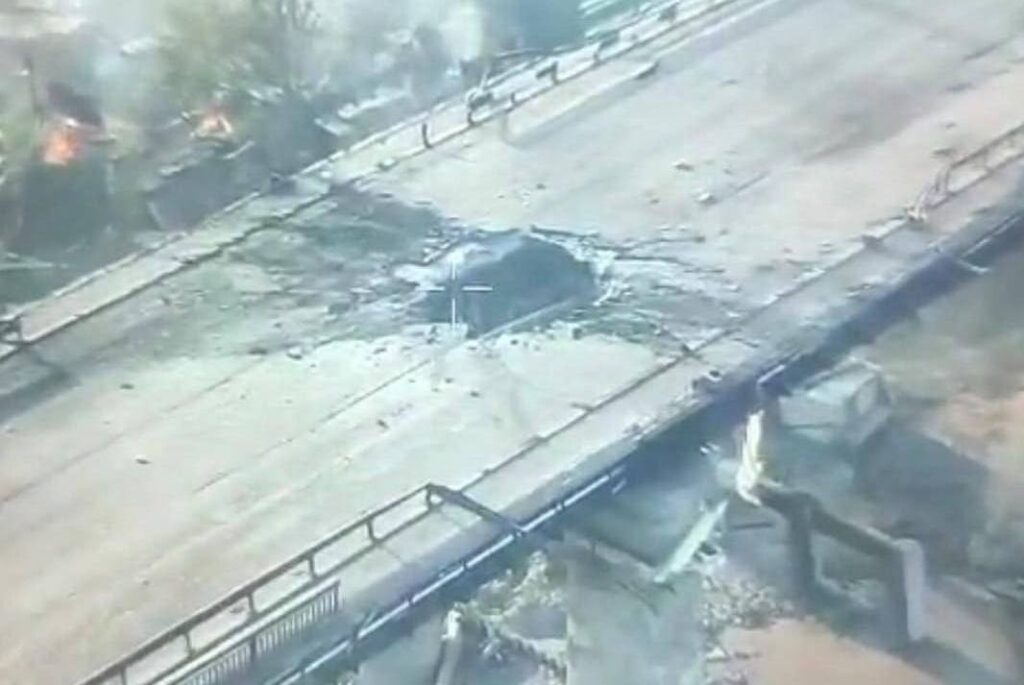 damaged still stands russians bombed vehicular bridge kherson hole over kosheva river 2 2025 @ivant_21 militarnyi suffered heavy damage after russian airstrike hit city guided bomb targeted crossing connects central