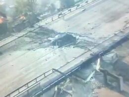 damaged still stands russians bombed vehicular bridge kherson hole over kosheva river 2 2025 @ivant_21 militarnyi suffered heavy damage after russian airstrike hit city guided bomb targeted crossing connects central