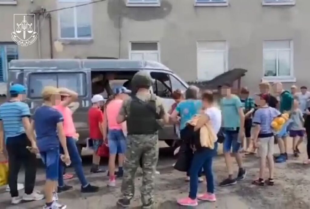 Ukrainian prosecutors gathered evidence showing Russian forces transported children from a special school in then-occupied Novopetrivka village through occupied Crimea to Russia's Anapa Oblast, where they faced daily ideological pressure including forced anthem singing and Ukrainian language bans.