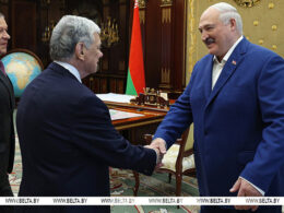 John Cole, US deputy special representative for Ukraine, shaking hands with Belarusian President Alexander Lukashenko during a meeting in Minsk.