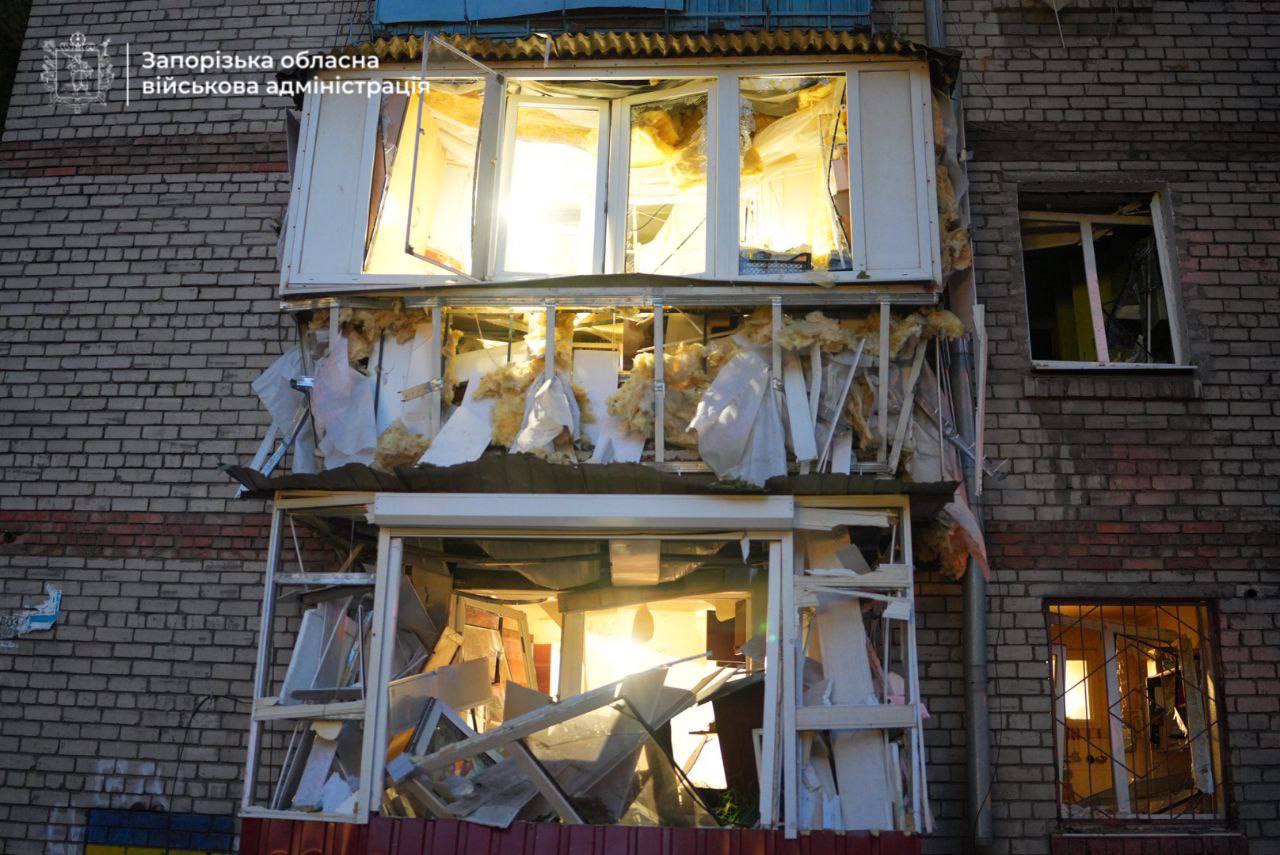 A residential apartment building in Zaporizhzhia shows extensive damage after Russian drone strikes on 6 September, with balconies destroyed and debris scattered throughout multiple floors.