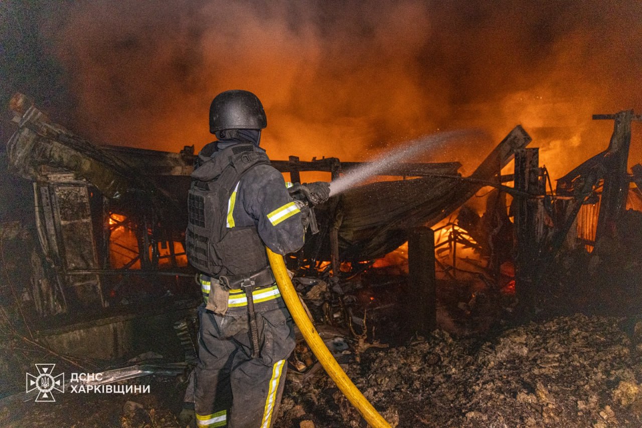A firefighter battles blazes in Kharkiv following the Russian drone attack on 23-24 September that damaged civilian infrastructure.