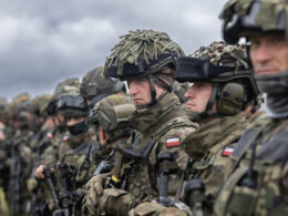 Polish soldiers from the NATO Response Force (NRF) stand ready to begin a live-fire exercise alongside French and Romanian troops at the NATO multinational battlegroup in Romania in June 2022.