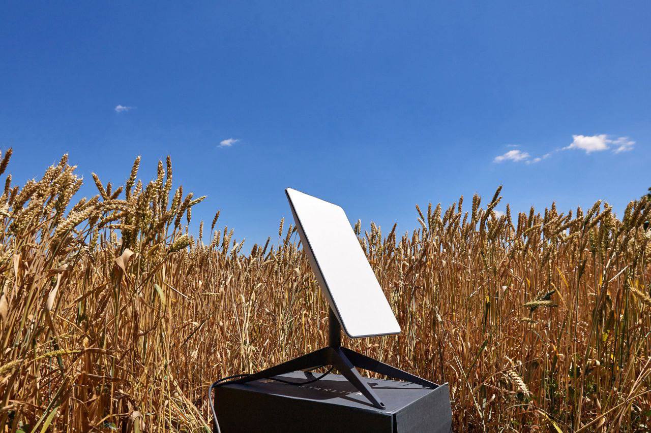 A Starlink satellite terminal set up in a Ukrainian wheat field. Illustrative image shared by Digital Minister Mykhailo Fedorov via Telegram