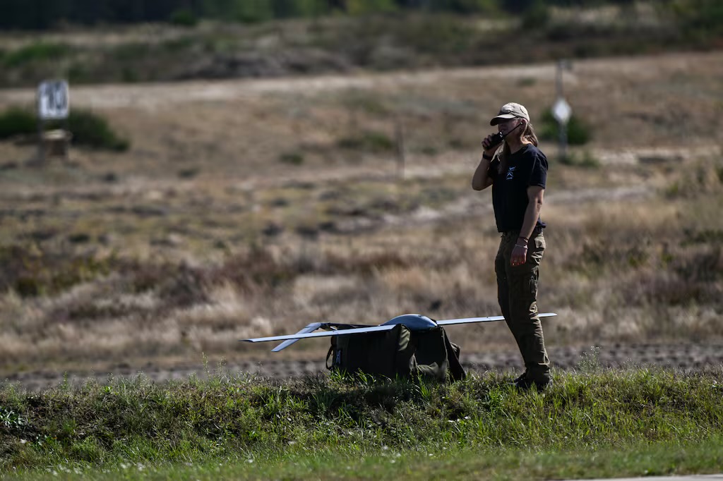 A contractor waits to deploy a drone during the Iron Defender 25 military exercise on Sept. 18, 2025, in Nowa Deba, Poland. Source: Omar Marques/Getty Images