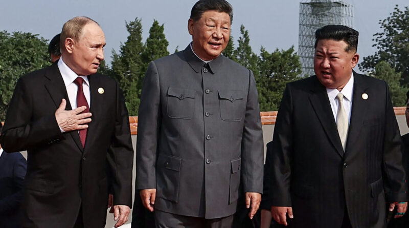 Russian President Vladimir Putin, Chinese President Xi Jinping, and North Korean leader Kim Jong Un walk together during the military parade in Beijing on 3 September 2025, commemorating the 80th anniversary of Japan's World War II surrender.
