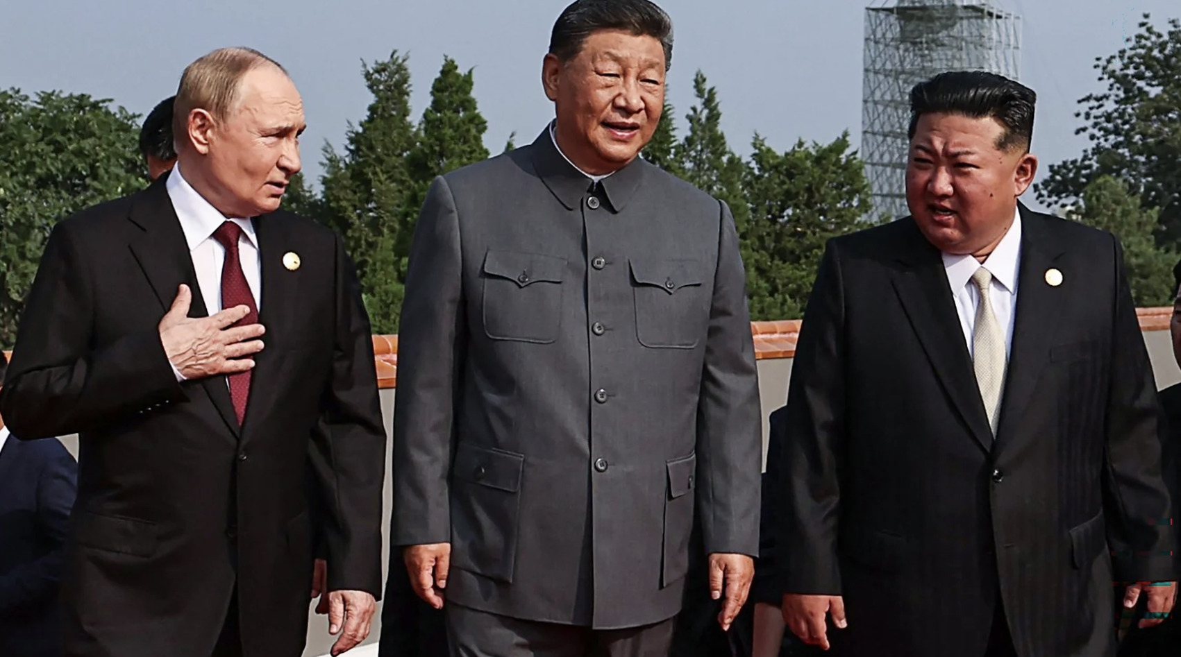 Russian President Vladimir Putin, Chinese President Xi Jinping, and North Korean leader Kim Jong Un walk together during the military parade in Beijing on 3 September 2025, commemorating the 80th anniversary of Japan's World War II surrender.
