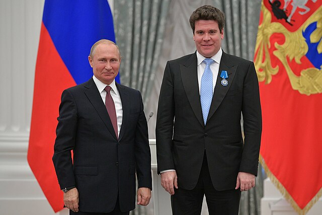 Denis Matsuev standing next to Vladimir Putin; pianist later faced concert cancellations in Europe due to his Kremlin ties.