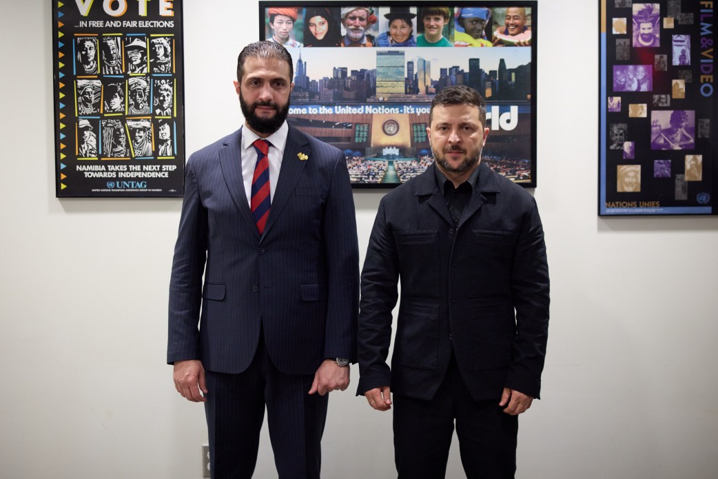 Ukrainian President Volodymyr Zelenskyy (right) meets with Syrian leader Ahmed Hussein al-Sharaah (left) in New York during the UN summit, where the two countries signed a joint communiqué restoring diplomatic relations.