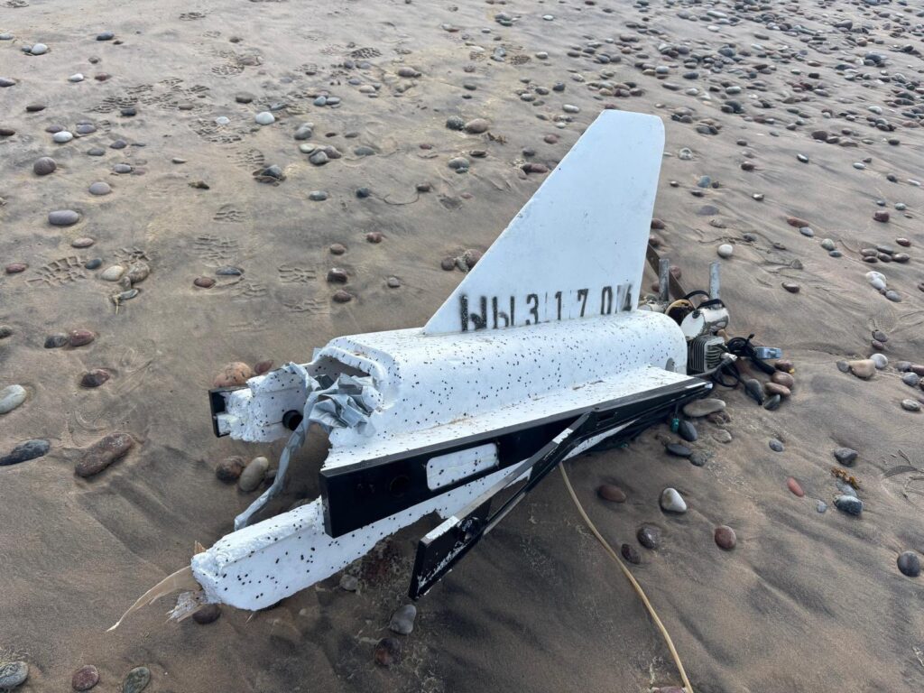 russian gerbera drone wreckage washes onto latvian beach after drifting sea tail section styrofoam bearing serial number starting cyrillic letters ыы washed ashore latvia’s ventspils district latvia fragment military up