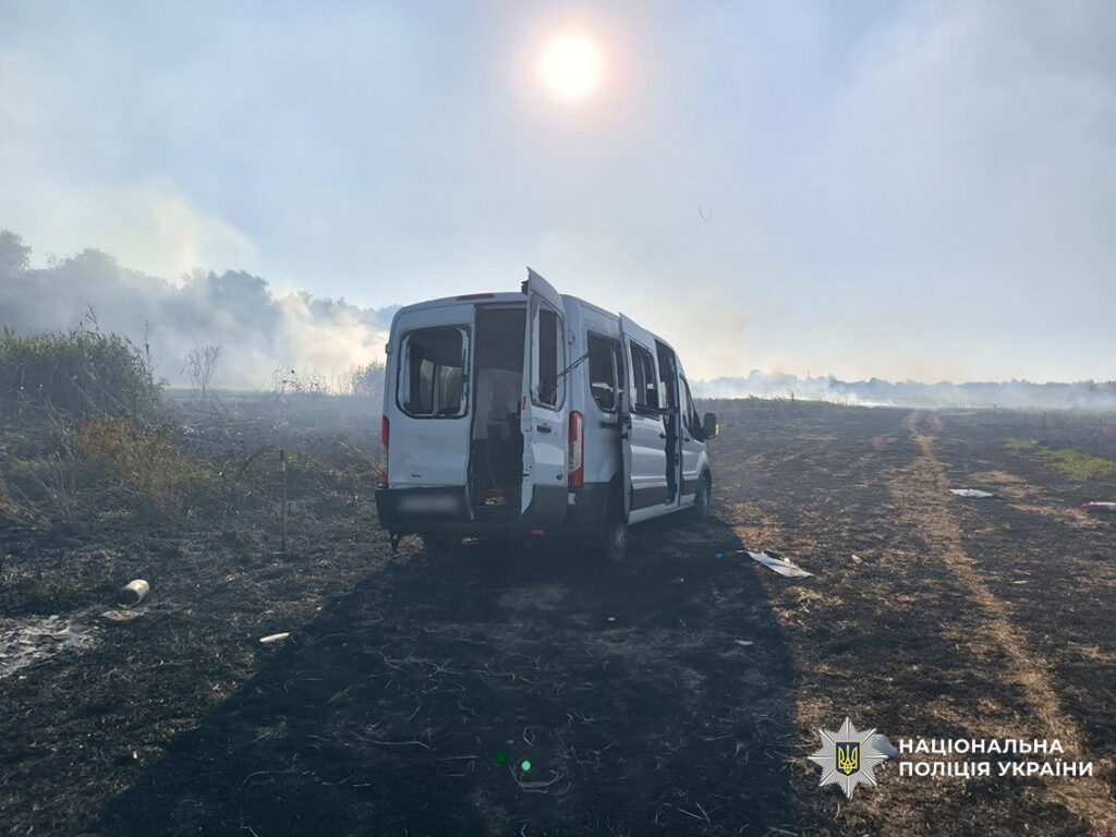 Damaged van in a field after a missile strike near Chernihiv, Ukraine, targeting a humanitarian demining team.