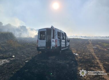 Damaged van in a field after a missile strike near Chernihiv, Ukraine, targeting a humanitarian demining team.