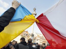 Polish and Ukrainian flags tied together at a rally in Kyiv.