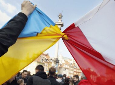 Polish and Ukrainian flags tied together at a rally in Kyiv.