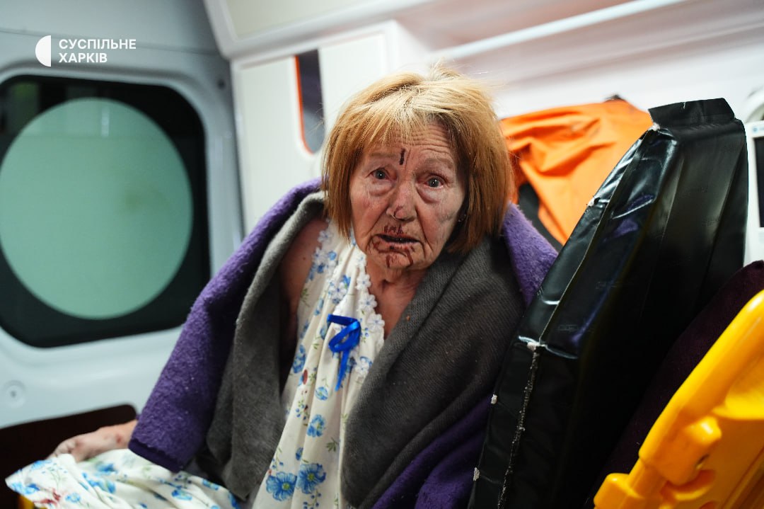An injured woman receives medical assistance in an ambulance following the Russian strike on Kharkiv on 1 October 2025.