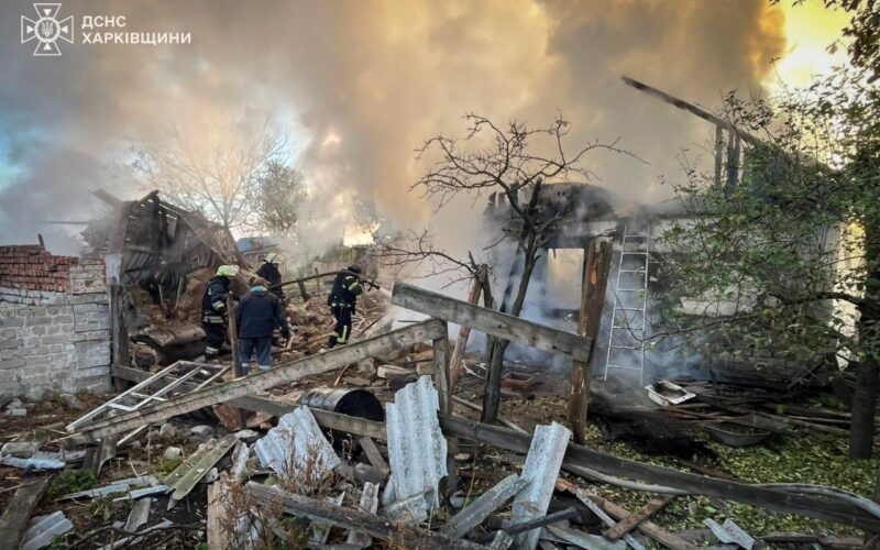 Ukrainian rescuers work to extinguish flames at a destroyed private home in Orilka, Kharkiv Oblast, after a Russian Shahed drone strike injured a family of four on 20 October.