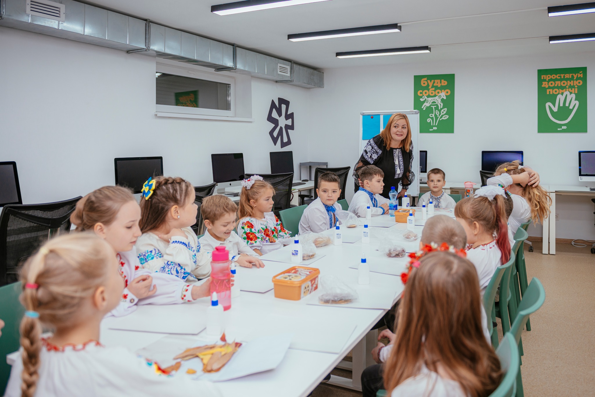 Ukrainian students attend class in the new underground educational center in frontline Izium, Kharkiv Oblast.