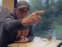 A screenshot from video shows Russian-speaking Latvian citizen Aleksandrs Vabiks gesturing aggressively at a Ukrainian family on a Swiss train after he heard them speaking Ukrainian, 13 October.