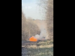 A burning vehicle on a road in Kemerovo Oblast, Russia, in footage released by Ukraine's Defense Intelligence (HUR) showing the 25 October explosion that allegedly killed police Lieutenant Colonel Veniamin Mazzherin linked to war crimes in Kyiv Oblast in 2022.