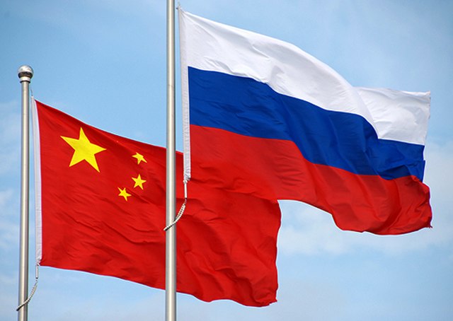 Flags of Russia and China.