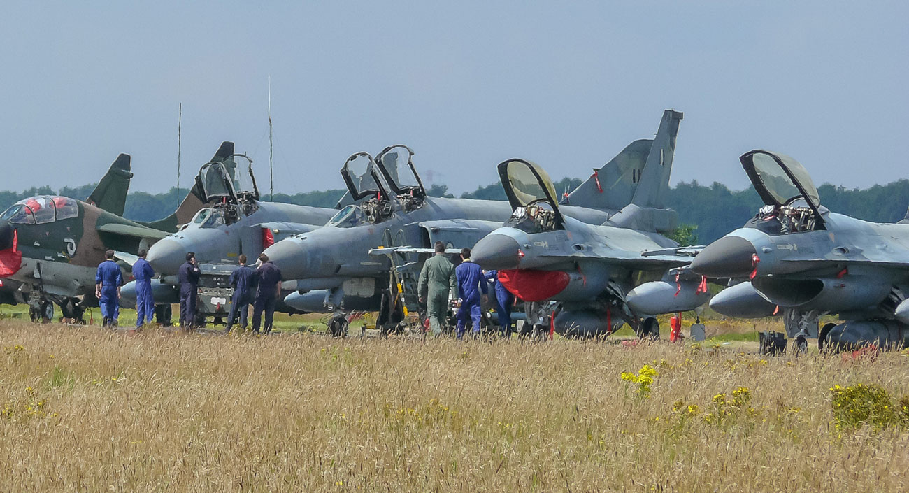 unidentified drones repeatedly breach airspace over belgium's f-35 site storing nukes — suspects found · post belgian allied fighter jets parked along flightline kleine-brogel air base during operational integration exercise