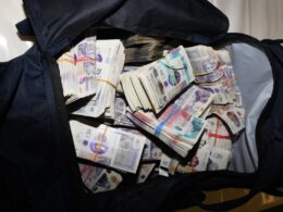A bag full of cash seized in the UK as part of Operation Destabilise. Photo: UK National Crime Agency