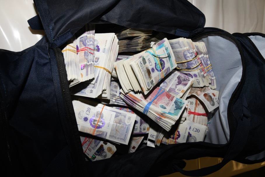 A bag full of cash seized in the UK as part of Operation Destabilise. Photo: UK National Crime Agency