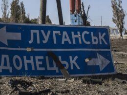 russia launches forced call-up reservists occupied luhansk oblast · post damaged road sign points toward donetsk war-scarred area eastern ukraine militarnyi download news ukrainian reports