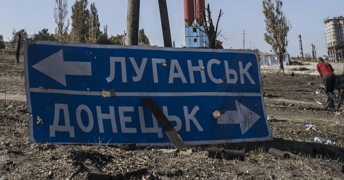 russia launches forced call-up reservists occupied luhansk oblast · post damaged road sign points toward donetsk war-scarred area eastern ukraine militarnyi download news ukrainian reports