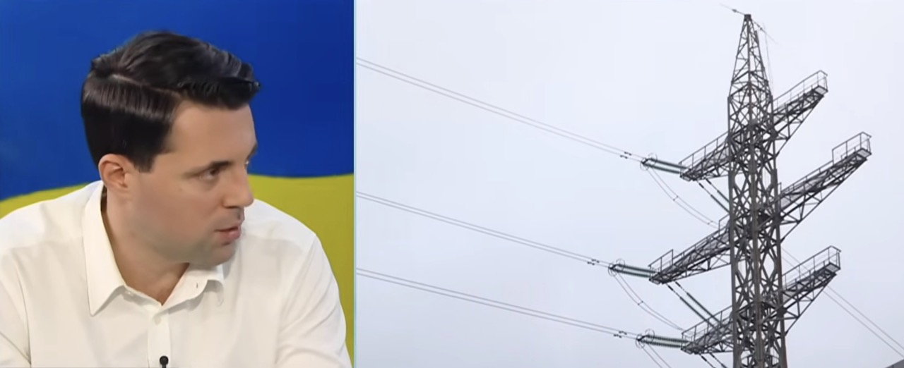 Former Ukrenergo chief Volodymyr Kudrytskyi during Espreso interview with Ukrainian flag background, alongside image of electrical transmission tower representing Ukraine's power grid infrastructure