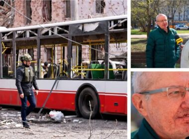 A three-part photo collage. On the left, a large photo shows a damaged red and white bus on a street, with debris on the ground and two people in vests walking near it. On the top right, a smaller photo shows an older man with glasses in a green jacket being interviewed by a reporter with a microphone in an outdoor setting. Below it, on the bottom right, is a close-up portrait of the same man, showing cuts and dried blood on his cheek and nose.