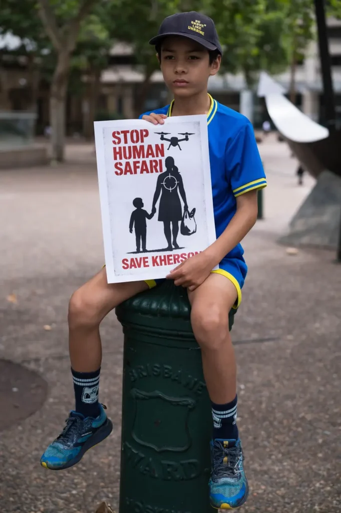 Russia hunts kills protest targets civilians with drones stop human safari save kherson children drones