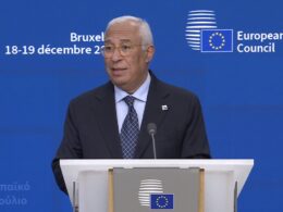 European Council President António Costa at podium announcing €90bn EU loan for Ukraine at Brussels summit, 18 December 2025