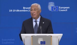European Council President António Costa at podium announcing €90bn EU loan for Ukraine at Brussels summit, 18 December 2025