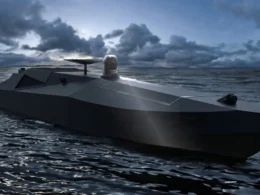 Ukraine's Magura 5 naval drone at sea, a stealthy black unmanned surface vessel equipped with sensors and used by Group 13 to strike Russian Black Sea Fleet ships