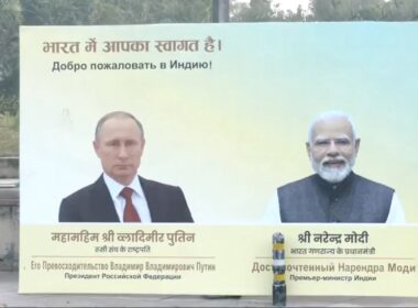 A billboard in New Delhi displaying portraits of Russian President Vladimir Putin and Indian Prime Minister Narendra Modi with "Welcome to India" written in Hindi and Russian ahead of Putin's December 2025 visit